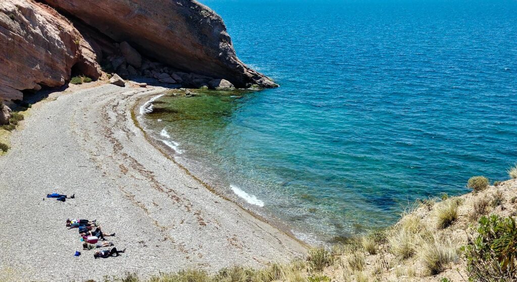 Taking a sunbath at the shores of the Titicaca, Puno